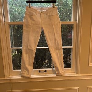Frame le garçon white jeans with adjustable rolled cuffs.